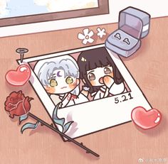 an image of two people in a photo frame with flowers and hearts on the table