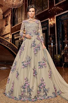 COLOR : Dull Khaki FABRIC : Top - Premium Net, Bottom - Santoon, Inner - Premium Net & Satin, Dupatta - Premium Net WORK : Resham Embroidery, Hand Work, Laser Cut Flowers, Motifs, Stones, Pearls, Swarvoski, Sequins, Lace Border OCCASION : Wedding, Reception, Engagement, Party Wear, Bridal Wear READY-TO-WEAR : NoSTITCHING : Available as semi-stitched fabric, can be stitched using standard size option (+$30). Note: There might be a slight color variation due to lighting and flash used during p Wedding Anarkali, Anarkali Tops, Suit Anarkali, Designer Salwar Kameez, Anarkali Salwar, Abaya Style, Designer Anarkali, Anarkali Gown, Wedding Dresses For Girls