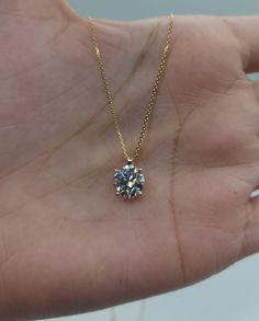 This is a beautiful Lab Grown diamond design pendant. It is set in real solid 14Kt Gold and the chain is 14Kt Gold as well.  You can choose if you want 14Kt White Gold, 14Kt Yellow Gold or 14Kt Rose Gold.  It has a special loop where the chain goes through so that the diamond sits comfortably on you when you wear it. We have a lot of beautiful jewelry with natural diamonds.  If any listing states "diamond" then it is a natural diamond. If the listing states "Lab Grown" it is a Lab Grown diamond. Gold Solitaire Necklace With Diamond Cut Cubic Zirconia, Gold Solitaire Moissanite Necklace, 14k Gold Solitaire Necklace With Vvs Clarity For Anniversary, 14k Gold Solitaire Necklace With Diamond Cut, Gold Solitaire Necklace With Brilliant Cut For Anniversary, Gold Solitaire Necklace With Diamond Cut Pendant, Dazzling 14k Gold Solitaire Necklace With Round Pendant, Dazzling 14k Gold Solitaire Necklace, Gold Moissanite Solitaire Pendant Necklace