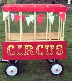 a red wagon with the word circus painted on it