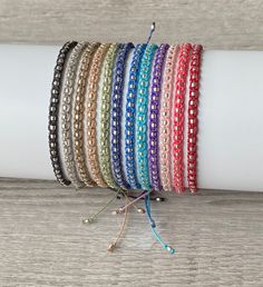 the bracelets are all different colors and sizes