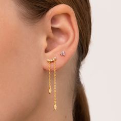 Amazing gold earrings with zircons and two long golden chain. It is an elegant jewel that will give to your look a sophisticate touch. It is perfect to combine with other earrings or wear it alone for a minimalist look. Made of sterling silver 925 and plated with 18kt gold. Details: * Crafted in Gold plated .925 sterling silver * Also available in 925 sterling silver * SOLD INDIVIDUALLY OR BY PAIRS All jewelry comes in beautiful packaging, gift ready. Made with love Feel free to contact me with Elegant Gold Ear Climbers With Adjustable Chain, Elegant Ear Climbers With Adjustable Chain For Gift, Gold Plated Delicate Chain Earrings For Party, Party Earrings With Delicate Gold-plated Chain, Dainty Cubic Zirconia Earrings With Adjustable Chain, Party Gold-plated Earrings With Delicate Chain, Dainty Earrings With Delicate Chain For Party, Dainty Delicate Chain Earrings For Party, Gold Dainty Cubic Zirconia Ear Climbers