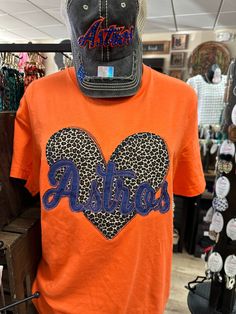 Astros Cheetah Heart; Applique Orange Tee Astros Game Outfit Women, Astros Shirt Ideas, Astros Shirt, Houston Astros Shirts, Astros Hoodie, Astros World Series 2022 Shirts, Astros Game, Orange Tees, Heart Tee