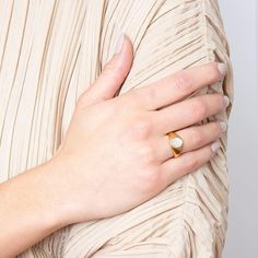 Vintage inspired gold oval signet ring with natural white shell. Instantly creating an efortless chic style to your look. ………………………………….D E T A I L S• Materials: Stainless steel, 18k gold plating, Natural shell.• Size: US 6, US 7, US 8• This product is hypoallergenic and tarnish resistant Classic Oval White Signet Ring, Classic White Oval Signet Ring, White Adjustable Elegant Signet Ring, Elegant White Adjustable Signet Ring, Classic Gold Open Ring Opal Ring, Classic Gold Opal Open Ring, Elegant White Oval Enamel Ring, White Oval Timeless Signet Ring, Timeless White Oval Signet Ring