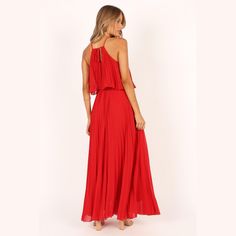 Wear this stunning red maxi dress to your next party! The maxi length and high neckline with front tie close feature ensures you'll look fabulous, while the pleated overlay design adds an extra touch of femininity. Party Maxi Dress With Pleated Back, Party Floor-length Maxi Dress With Pleated Bodice, Pleated Bodice Floor-length Maxi Dress For Party, Party Maxi Dress With Pleated Bodice And Floor-length, Floor-length Party Maxi Dress With Pleated Bodice, Floor-length Maxi Dress For Party With Pleated Bodice, Pleated Bodice Maxi Dress For Party, Floor-length Maxi Dress With Pleated Back For Night Out, Pleated Chiffon Floor-length Maxi Dress