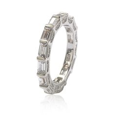 Stunning, timeless and classy eternity band ring. This brilliant ring is filled with rich, high quality emerald-cut cubic zirconia baguettes, hand set horizontally in the trendiest, yet classy U-shape setting, featuring glistering pave gemstones draping across the sides, all hand set in high polished 925 sterling silver. Every single ring is man made, making it a unique masterpiece. Surprise someone special in your life with this luxurious anniversary ring. Could be used as a wedding ring as wel Baguette Eternity Band, Gemstone Brooch, Cubic Zirconia Bracelet, Cubic Zirconia Necklace, Cubic Zirconia Jewelry, Eternity Band Ring, Cubic Zirconia Earrings, Creating Jewelry, Cubic Zirconia Rings