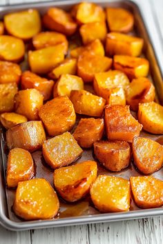 cooked potatoes on a baking sheet ready to be baked in the oven or used as an appetizer