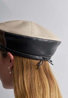 Introducing a timeless classic to your wardrobe with our beret. this stylish and versatile hat is designed with the traditional beret style. it features a tie for adjustable sizing ensuring a perfect fit.    composition    100% recycled pu exterior recycled pet lining    size & fit  57cm circumference (adjustable) brim: 6cm    about brie leon  brie leon makes accessories to be worn and treasured as a companion and memory. it's jewellery and bags for business pleasure and everything in between. l Leon Logo, Unique Hijab, Brie Leon, Beret Style, Dog Day Afternoon, Types Of Hats, Couture Details, Cute Hats, Cool Hats