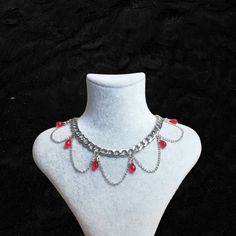 ▪Grunge Choker▪ Gothic design formed by the combination of red and chain ❤ Really cool chunky chain choker necklace ▪ 35 cm and adjustable ▪ It is handmade 🖤 ▪ If you have any questions, I'll be happy to answer 💌 ▪ Avoid contact with perfume or other chemicals 🌿 Emo Jewelry With Adjustable Chain For Parties, Emo Style Jewelry With Adjustable Chain For Concerts, Emo Style Chain Jewelry For Gift, Emo Chain Jewelry For Gift, Emo Metal Necklace For Festivals, Emo Style Festival Jewelry With Chain, Silver Emo Necklace For Festival, Silver Emo Style Necklace For Festivals, Grunge Style Jewelry With Adjustable Chain For Concerts