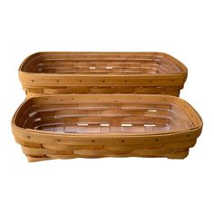 two wooden baskets sitting on top of each other