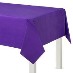 a purple table cloth on top of a white chair