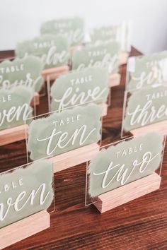 place cards with names on them sitting on a table