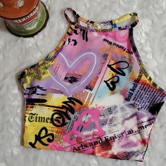 Colorful Graphic Print Crop Top...Tank... Tee...I Also Have This Available In A Body Suit... ....Be Sure To Look At All The Pictures ....Measurements Are Shown In The Photos, And Are Approximate..... ...Ask Any Questions S Before Purchasing...Bundle & Save On Shipping...Tu#44 Nyc Fashion Week, Top Tank, Cami Tanks, Body Suit, Cropped Tank Top, Graphic Tank, Pink Yellow, Graphic Prints, To Look