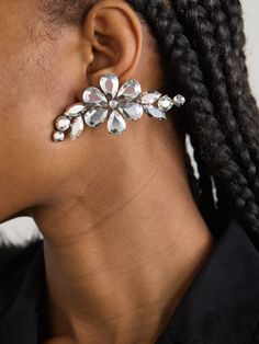 Romantic, feminine details are key to Simone Rocha's collections. Resembling flowers and leaves, these earrings are crafted from silver-tone metal ornamented with glinting crystals. The half-moon profile follows the curve of your lobe beautifully. Elegant Crystal Earrings In Flower Shape, Elegant Crystal Flower-shaped Earrings, Elegant Flower-shaped Crystal Earrings, Elegant Silver Flower-shaped Crystal Earrings, Luxury Silver Diamond Flower Earrings, Luxury Single Silver Crystal Earring, Elegant Flower-shaped Earrings With Rhinestones, Elegant Flower-shaped Earrings With Sparkling Stones, Elegant Flower Shaped Rhinestone Earrings