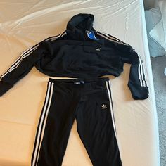 This Cropped Hoody Still Has The Tags On It And Has Never Been Worn. Leggings Have Been Worn Once But In Perfect Condition! Leggings Are Xl But Run Small & Hoody Is L. Can Be Bought Together For Price Listed Or Ask For Individual Pricing. Adidas Fitted Long Sleeve Activewear, Adidas Casual Streetwear Activewear, Adidas Sportswear Hoodie With Three Stripes, Hooded Sweats For Winter Workout, Adidas Long Sleeve Tracksuit Sportswear, Winter Adidas Activewear With Three Stripes, Adidas Long Sleeve Tracksuit, Stretch Athleisure Hoodie For Jogging, Adidas Sportswear Tracksuit