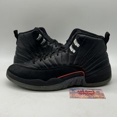 This Air Jordan 12 Utility Grind Black (DC1062-006) is the perfect addition to any sneaker collection. The shoe features a black colorway with a leather upper material, making it durable and stylish. The model is a Men's size 11.5 and is a part of the Air Jordan product line. The sneaker has a unique Style Code (DC1062006) and was released in 2021. It is perfect for athletic activities and is categorized under Men's Shoes and Athletic Shoes. The shoe brand is Jordan and is perfect for sneakerheads looking to add a new pair to their collection. No box Jordan Mid-top Fade-resistant Streetwear Shoes, Casual High-top Jordan Shoes For Outdoor, Low-top Leather Basketball Shoes For Streetwear, Leather Mid-top Basketball Shoes For Outdoor, Urban Style Lace-up Jordan Sports Shoes, Outdoor Leather Basketball Shoes With Rubber Sole, Streetwear Black Sneakers With Studded Outsoles, Casual Leather Basketball Shoes For Streetwear, Fade-resistant Lace-up Jordan Shoes For Streetwear