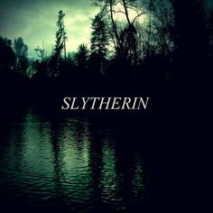 the word slytherin written in white on a dark background with trees and water