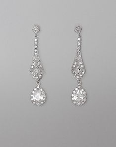 "Elegant 'modern-vintage' Bridal earrings have been designed in a delicate open-work style studded with cubic zirconium crystals with a crystal teardrop, to add a gorgeous delicate sparkle to your wedding day. Set in tarnish resistant 18K Rhodium (White Gold Plate) with high quality cubic zirconium crystals for heirloom quality. Allergy free. L = 1 3/4\" (4.5 cm) Our model wears our store sample ear post. ★Shopping for your bridal party? Contact us for special pricing. Please read our shop polic Bridal Jewelry Vintage Earrings, Crystal Drop Earrings Wedding, Violet Earrings, Bridal Jewellery Earrings, Vintage Wedding Jewelry, Bridal Jewelry Vintage, Crystal Bridal Earrings, Crystal Chandelier Earrings, Bridal Earrings Drop