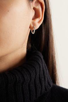 The unique, peaked shape of Repossi's 'Antifer' single earring is subtle, but still stands out from classic hoops - it's meant to mimic the shape of the infamous cliffs in Normandy. Perfect for creating an asymmetric look, it's been cast in Italy from polished 18-karat white gold and encrusted with a neat row of glittering pavé diamonds, totaling 0.07-carats. Wear it alongside pieces from the 'Harvest' collection. Diamond Color Grade, White Gold Earrings, Single Earring, Gold Hoop Earrings, White Gold Diamonds, Pave Diamonds, White Diamond, Diamond White, Ear Piercings