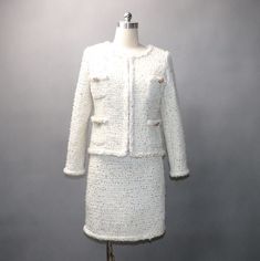 Elevate your style with our Women's Custom Made Gold Sequinned White Wool Tweed Jacket and Skirt Suit. This unique and elegant ensemble is tailored to make you look and feel your best at winter weddings, speech days, graduation ceremonies, and formal events. ✨ Jacket Features: A luxurious white wool tweed fabric that exudes classic elegance and warmth. Beautifully adorned with intricate gold sequin detailing for a touch of glamour. Custom-made to ensure a perfect fit and a unique piece crafted just for you. Versatile and ideal for winter weddings, speech days, and formal gatherings. ✨ Skirt Features: A matching skirt that perfectly complements the jacket. Designed for comfort and ease of movement, suitable for various occasions. Crafted with meticulous attention to detail for a polished ap Chanel Suits For Women, Women White Suit, White Tweed Dress, White Skirt Suit, Tweed Jacket And Skirt, Tweed Skirt Suit, Business Skirt, White Tweed, Pink Suit