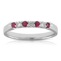 Rubies and diamonds in a classic band, makes this ring perfect for an anniversary or wedding. Classic Stackable Rings With Diamond Accents, Classic Diamond Bands With Prong Setting, Classic Diamond Band With Prong Setting, Elegant Ruby Ring With Diamond Round Cut, Fine Jewelry Ruby Ring With Round Cut Diamond, Formal Cubic Zirconia Stackable Rings With Center Stone, Elegant Ruby Ring With Diamond In Round Cut, Elegant Platinum Ruby Ring With Round Cut, Classic Ruby Ring With Pave Setting For Anniversary