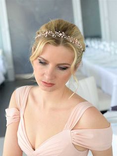 Delicate%20Rose%20Gold%20Wedding%20Headband%0D%0AOur%20hand-wired%20rose%20gold%20wedding%20headpiece%20vine%20boasts%20a%20floral%20motif%20with%20sprays%20of%20brilliant%20crystals%20and%20rhinestones.%20The%20crystals%20rest%20on%20a%20beautiful%20tiara%20vine%20with%202%20side%20combs%20for%20arranging%20in%20your%20wedding%20day%20hairstyle.%0D%0AA%20beautiful%20addition%20to%20your%20bridal%20ensemble!%0D%0AColor%3A%20Rose%20Gold.%0D%0ASize%3A%26nbsp%3B10%201%2F2%22%20long%20and%201%201%2F4%22%20high.%0D%0AStyle%3A%201402RG.%0D%0APlease%20allow%201%20week%20for%20delivery.%0D%0AShipping%20Policy.%0D%0AReturn%20Policy.%0D%0A%26nbsp%3B%0D%0A%26nbsp%3B Gold Wedding Headband, Rose Gold Wedding Headpiece, Rose Gold Wedding Accessories, Crystal Bridal Tiaras, Special Occasion Hairstyles, Beautiful Tiaras, Beautiful Hair Accessories, Rose Gold Crystal, Bridal Hair Vine