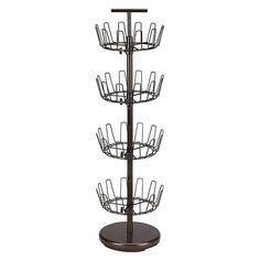 a four tiered metal rack with wine glasses on it