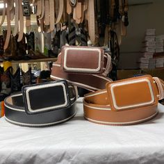 Need a durable, life lasting and nice looking belt? Really nice solid genuine leather belt with a 1.5 inch width made for any occasion and event. Made to be put through any activity and still be in a great condition! Looks great for style and works better when needed. Made from stainless steel hardware with a solid color design. Available in 3 different colors brown, maroon and black! All have a nice embroidery style design to choose the right one that best suits you. Available in all sizes 30-4 Cowboy Belt, Wide Leather Belt, Colors Brown, Genuine Leather Belt, Suspender Belt, Cool Suits, Western Cowboy, Choose The Right, Suspenders