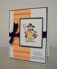 a handmade card with an image of a scarecrow holding a broom and wearing a hat