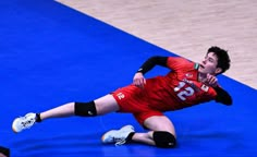 a volleyball player dives for the ball during a match against china on march 25