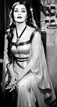 a black and white photo of a woman in costume