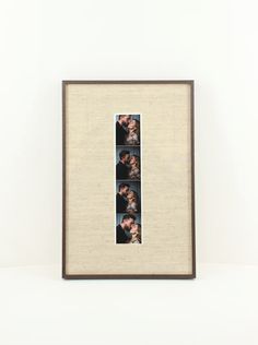 three photos in a brown frame hanging on a wall