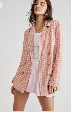 Elevate your style game with this stunning Free People Olivia blazer in a beautiful pink check pattern. The mid-length jacket features long sleeves and a button closure, with a belted accent for added flair. Perfect for travel, workwear, or casual outings, this jacket is a must-have for any fashion-forward woman. Crafted from a Poly/Viscose outer shell and lined with 100% viscose, this jacket is comfortable and versatile for all seasons. With pockets for added convenience and a stylish design, you'll be turning heads everywhere you go. Don't miss out on this brand new, never worn Free People jacket, perfect for any occasion. Brand New with Tags! MSRP $178 Gingham Blazer, Gingham Jacket, Free People Velvet, Pink Fits, Free People Jacket, Classic Blazer, Long Blazer, Pink Gingham, Gingham Print