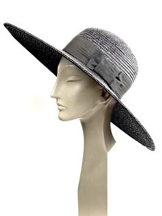 Elegant woman summer hat made with black natural straw braid of 8/9 millimeters wide. Adorned with a good quality 50mm wide black grosgrain ribbon with a bow onside the hat. The measurements in centimeters are 50 x 48. Brim length 15. (These measurements may vary slightly depending on the size of the hat) For its elaboration we only use very good quality and resistant straw braids. In our workshop in the Pyrenees we sew and work one by one our hats with wooden molds of our own design. For other Black Straw Hat, Mens Fedora, Summer Straw Hat, Womens Fedora, Fedora Hat Women, Summer Hats For Women, Straw Fedora, Oversize Women, Summer Hat