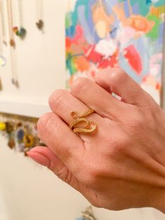 "ABOUT THIS PIECE: Beautiful adjustable textured sea creature ring. Available in stainless steel and 14K gold vermeil - both tarnish resistant. Please use drop down menu to make your selection.  CARE: To preserve your piece, avoid chemicals on it (e.g. chlorine) SHIPPING: Please read my \"Shop Announcement\" for details on shipping. If your order is a gift, we are happy to directly ship it to the recipient's address, just be sure to enter their address & not yours.   PACKAGING: Your item will arrive beautifully packaged in an eco-friendly blue soft microfiber pouch.  GIFT WRAP OPTION: I offer free gift wrapping. Your item will arrive wrapped in our signature blue beach wrapping paper with a sunshine sticker on top. If you'd like your item gift wrapped please be sure to mark it as a gift or Adjustable Snake Ring Fine Jewelry For Gift, Gold Snake Shape Rings For Anniversary, Gold Plated Snake Ring Gift, Adjustable Gold Snake Ring Gift, Fine Jewelry Snake-shaped Rings For Gifts, Unique Gold Snake-shaped Rings, Mermaid Signet Ring, Adjustable Yellow Gold Snake-shaped Ring, Creature Marine