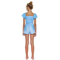 Little Peixoto Enzo short set in Sky Blue Prairie. Top features smocked bodice with eyelet puff sleeves with elastic cuffs. Shorts have a smocked waist with eyelet slant pockets. Cotton. Size Conversion: (XS = 2/4), (S = 6/8), (M = 10/12), (L = 14). Short Set, 8 M, Puff Sleeves, Short Sets, Sky Blue, Smocking, Puff Sleeve, Bodice, Elastic