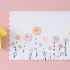 a card with buttons and flowers on it