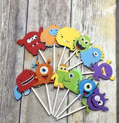 the monster cupcake toppers are colorful and cute