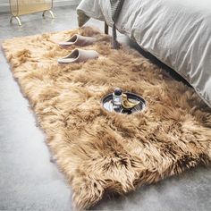 PRICES MAY VARY. ADD STYLE TO ANY ROOM: Please gently shake it for fluffy once unfolds. Ideal as your favorite living room carpet and area rug beside the bed. A must have accent in your home. SIZE: Approx. 60 in. x 84 in. On the fur size, 0.79-Inch-thick pile, reduce footsteps effectively and idea for use in nursery. MATERIAL: Front side: Artificial Animal Wool; Back side: Soft Ivory Suede backing looks like brushed leather. Give your home a touch of luxury. SUPER SOFT AND SHAGGY: Fuzzy and soot Fuzzy Rug, Faux Fur Area Rug, Faux Sheepskin Rug, Solid Color Rug, Faux Fur Rug, Fur Rug, Plush Sofa, Take Off Your Shoes, Fluffy Rug