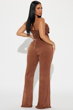 Available In Brown. Jumpsuit Strapless Sweetheart Neckline Front Bow Detail Pant Lined Wide Leg Stretch Inseam= 34" Self: 54% Polyester 38% Nylon 8% Spandex Lining: 100% Polyester Imported | Sunkissed Jumpsuit in Brown size XS by Fashion Nova Flirty Strapless Fitted Jumpsuits And Rompers, Fitted Strapless Flirty Jumpsuits And Rompers, Brown Stretch Jumpsuits And Rompers For Party, Brown Jumpsuit, Strapless Sweetheart Neckline, Leg Stretching, Brown Fashion, Bow Detail, Sweetheart Neckline