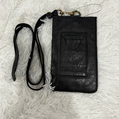 Free People Bright Lights Leather Wallet Pouch Black Brand New Without Tags. Excellent New Condition. Black 100% Leather Crossbody Strap Is Removable. Detachable Lanyard. Can Be Used As A Phone And Wallet Case. Comes From A Clean , Pet And Smoke Free Home Bin C Black Wallet With Removable Pouch For On-the-go, Versatile Black Clutch Pouch, Black Leather Rectangular Coin Purse, Black Phone Bag With Interior Card Slots For Everyday, Black Clutch Pouch For Everyday Use, Trendy Bags With Rfid Blocking For Everyday Use, Everyday Pouch Wallet With Mobile Phone Bag, Trendy Rfid Blocking Bags For Everyday Use, Trendy Rfid Blocking Bags