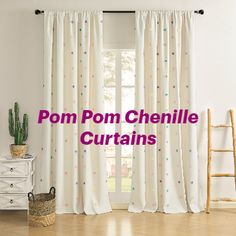 the room has white curtains with polka dots on them and pink lettering that reads pom - pom chenille curtains