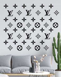 the louis vuitton wall decal is shown in black and white, with stars on