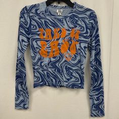 Nwt, Womens Size Medium Marble Swirls And Retro Graphics Let You Adopt A Groovy '70s Vibe In This Organic-Cotton Baby-Fit Tee. Exclusive Retailer 19" Length (Size Medium) Crewneck Long Sleeves 100% Organic Cotton Machine Wash, Line Dry Made In Turkey #Lavalamp #Groovy #70s #Psychedelic #Peace O Trendy Blue T-shirt For Fall, Trendy Light Blue Text Print Top, Trendy Blue Top With Text Print, Trendy Blue Tops With Text Print, Trendy Blue Tops For Streetwear, Orange Long Sleeve Tops With Letter Print, Blue Long Sleeve Trendy T-shirt, Trendy Blue Long Sleeve T-shirt, Blue Tops With Text Print For Spring