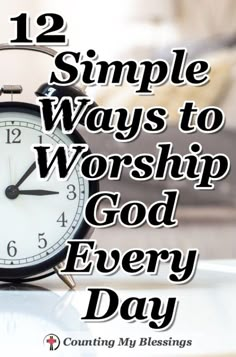 an alarm clock sitting on top of a table with the words 12 simple ways to worship god every day