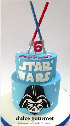 a star wars themed birthday cake with darth vader on top