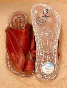 "Copy & Paste code: \"COMBINEDSHIPPING\" and get $50 off your second pair! Check out all men's leather sandals: https://www.etsy.com/shop/sandcruisers/?section_id=25459641 You will love these traditional Arabian sandals. The straps and soles are made of leather. The leather lining will feel so soft and comfortable against your foot. They are designed to fit your foot loosely with lots of room in the toe-ring and straps. The leather sole will mold and shape to your foot over time, even creati Leather Toe Post Flip Flops For Outdoor, Open Toe Beach Slides With Stitched Sole, Leather Huarache Sandals For Beach With Stitched Sole, Leather Huarache Sandals With Stitched Sole For Beach, Leather Huarache Sandals With Rubber Sole For Beach, Leather Toe Loop Slides For Beach, Leather Toe Ring Sandals With Rubber Sole For Beach, Leather Sole Slip-on Toe Ring Sandals For Beach, Beach Slip-on Toe Ring Sandals With Leather Sole