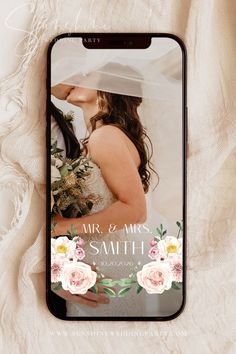 an iphone case with a wedding photo on the front and back cover, featuring flowers