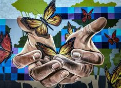 a painting of two hands holding butterflies in front of a wall with blue and green tiles