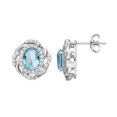 Featuring simulated aquamarine center stones and shimmering cubic zirconia accents, these sterling silver stud earrings offer a lovely look.EARRING DETAILSLength: .59 in. Backings: postMetal: sterling silverPlating: rhodiumPackaging: boxedSTONE DETAILSStone type: simulated aquamarineTotal weight: 1 7/8 ct.Shape: ovalSetting: prongCUBIC ZIRCONIA DETAILSTotal weight: 5/8 ct.Shape: roundSetting: prongGemstones may have been treated to enhance their appearance. Special care may be required.  Size: O Blue Oval Earrings With Diamond Accents, Oval Cubic Zirconia Birthstone Earrings, Oval Birthstone Earrings In Cubic Zirconia, Oval Stud Earrings, Sterling Silver Stud Earrings, Oval Earring, Cubic Zirconia Earrings, Round Stud Earrings, Silver Stud Earrings